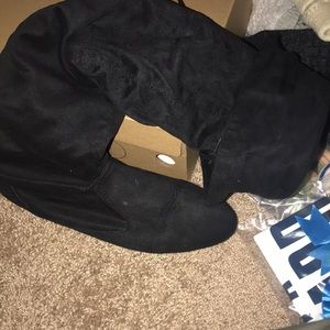 Black over the knee boots. Great for on the go....